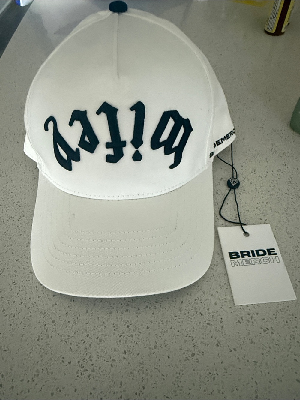 BRIDE Merch White Baseball Cap with Black Logo